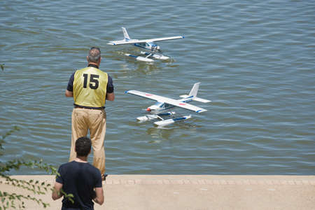 BADAJOZ, SPAIN - JUNE 8: unidentified parcipants taking part on exhibition show of RC hydroplanes on...