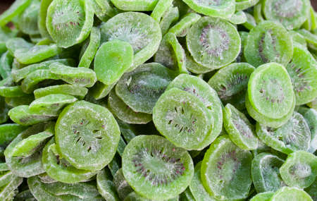 Bowl with dried kiwifruit. Slices displayed at street market stallの写真素材