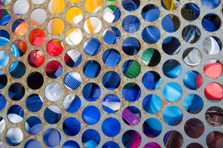 Solidarity Plastic Caps container. Caps are collected and donated to associations and they are exchanged for money.の写真素材