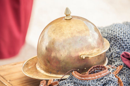 Roman Montefortino helmet over lorica hamata or chain mail armour. Roman military personal equipment replicaの写真素材