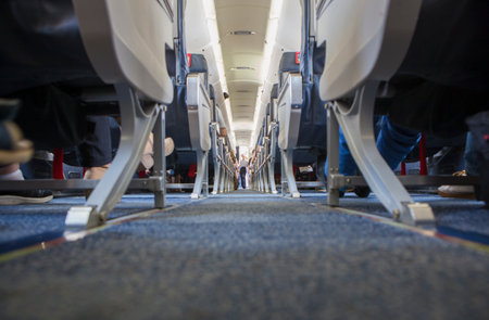 Normal class passenger jet airliner corridor. Ground viewの写真素材