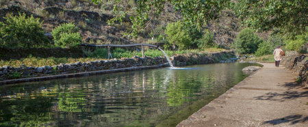 Local inhabitant going to work in his mountain orchard. Las Hurdes Region, Caceres, Extremadura, Spainの写真素材