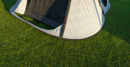 Iglu tents installed on artificial grass. Sunny natural lightの写真素材