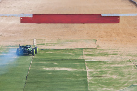 Merida, Spain - Jan 28th, 2024: Extremadura 1/8tt gas Championship RC Car. Cars crossing the finish lineのeditorial素材