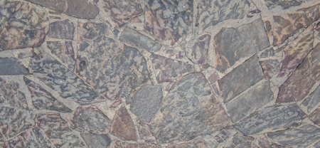 Cobblestone pavement made with undevastated quartzite slabs. Monumental Complex road surfaces, Caceres, Spainの写真素材