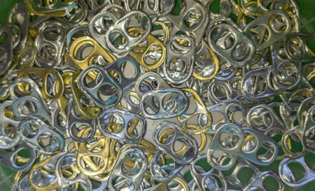 Many drinks can pop tabs. Overhead view