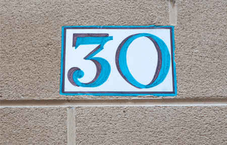 House number 30 thirty. Houses numbers with personality at Estella, Navarre, Spain
