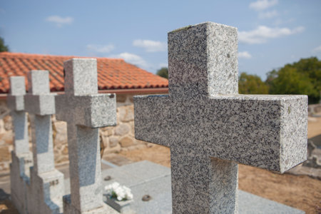 Stone crosses rising on the tombs. Funeral home services conceptの写真素材