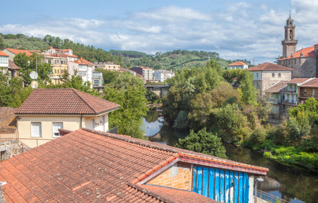 Ribadavia old town, Orense, Spain. River Avia overview with San Francisco Bridge at bottom