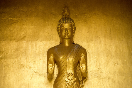 golden Statue of Buddha at peace in thailandの写真素材