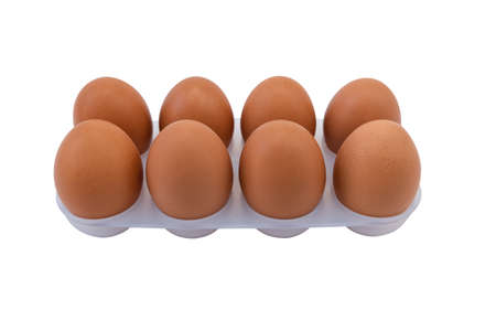 Isolated brown eggs on white backgroundの写真素材