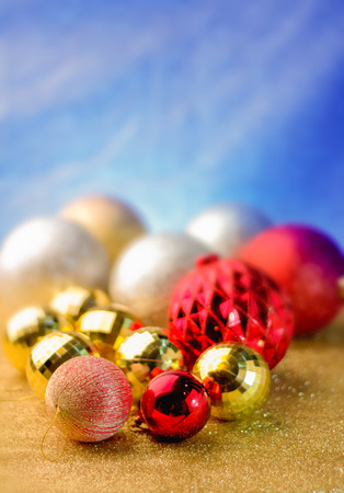 Christmas decoration on blue abstract glitter backgroundの写真素材
