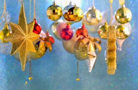 close up Christmas scene with tree gifts and fire in backgroundの写真素材