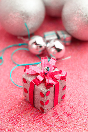 Merry Christmas and Happy New Year box gift with glitter backgroundの写真素材