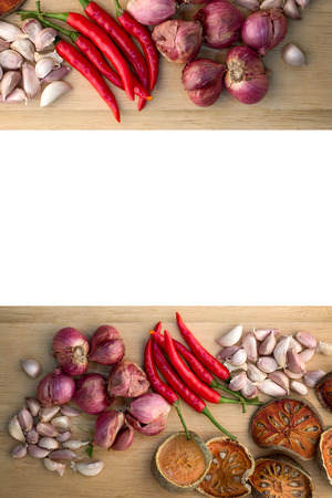 Various colorful spices on wooden table and wood plateの写真素材
