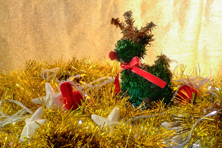 Deer and Christmas concept  in golden light background.jpgの写真素材
