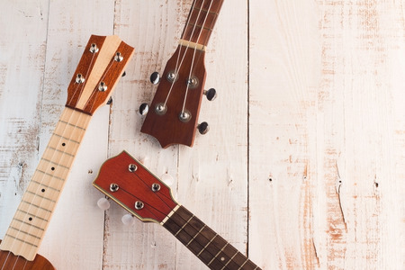 ukuleles in the white wooden terrace