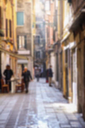 defocused walking street in venice italy backgroundの写真素材