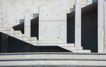 Abstract background with concrete wall and staircase of modern building