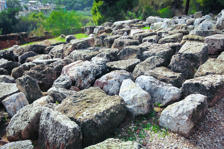 Ruined old stone wall from ancient temple in greece