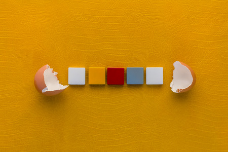 Goals word concept break from eggs shell with yellow backgroundの写真素材