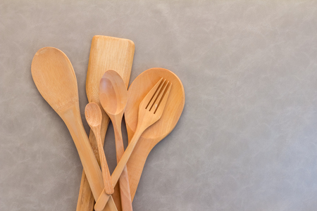 sets of wooden spoon on grey background.jpgの写真素材