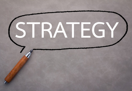 Close up of business strategy drawing circle on blackboard.の写真素材