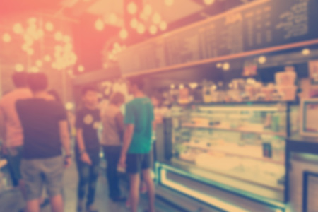 Blurred background made with Vintage Tones,Coffee shop blur background with bokehの写真素材