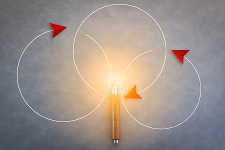 creativity ideas concept with red arrow fly over circle line and pencil on grey backgroundの写真素材