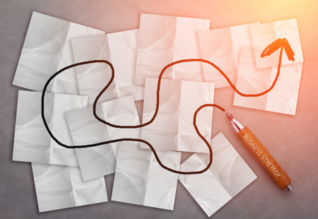 business solution concept with pencil drawing line on paper note with light flare effect