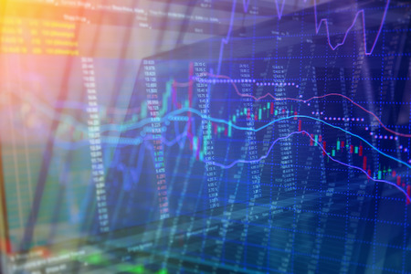 Candlestick graph overlaid on a black stock trading board with numerical data as a conceptual art...