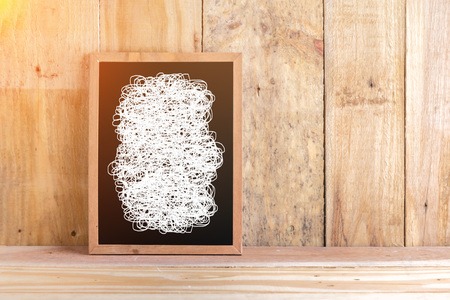 blackboard with white drawing line with wooden floor and wall background and free copy space for...
