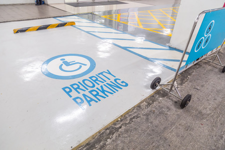 The international markings for a handicapped parking stall in a parking lot.の写真素材