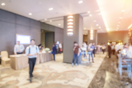 Abstract blurred people in press conference room, business concept, official new product launchesの写真素材