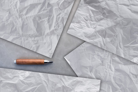 crumpled sheet texture of paper and wooden pencil creativity ideas concept and free copy space
