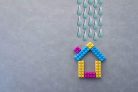 model house against the Field Rainy Season drawing on grey backgroundの写真素材