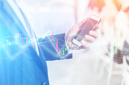 closed up business man using smartphone for connecting prople in business success conceptの写真素材