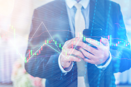 closed up business man using smartphone for connecting prople in business success conceptの写真素材