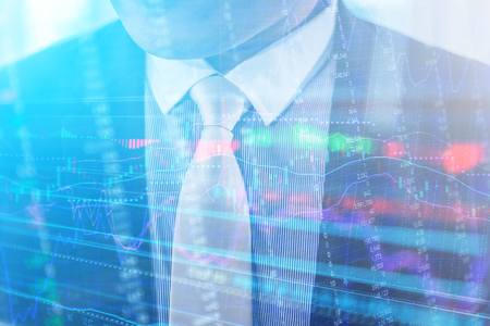 Double exposure of business finance stock graph analysis and businessman on the phone as Business development concept.の写真素材