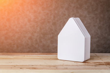 home sweet home house model with red on grey backgroundの写真素材