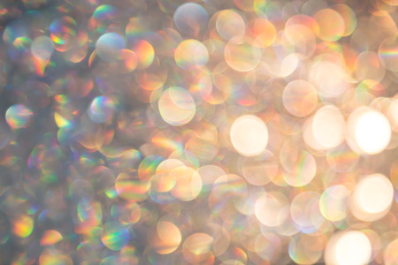 Christmas background. Festive abstract background with bokeh defocused lights and colorの写真素材