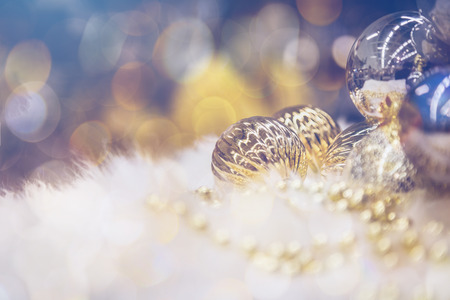 Christmas card with fir and decor on glitter backgroundの写真素材