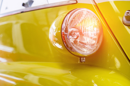Classic car's front headlight designの写真素材