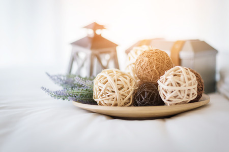 nature weave texture docorate ball with white backgroundの写真素材