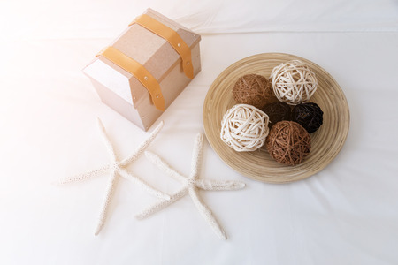 nature weave texture docorate ball with white backgroundの写真素材