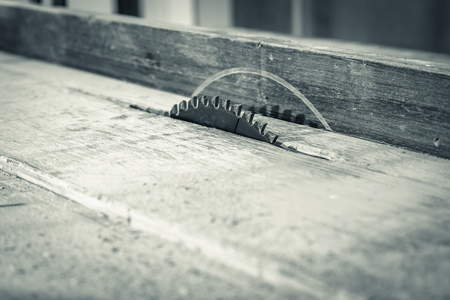 wood workshop with handcraft tools and raw wood on construction siteの写真素材