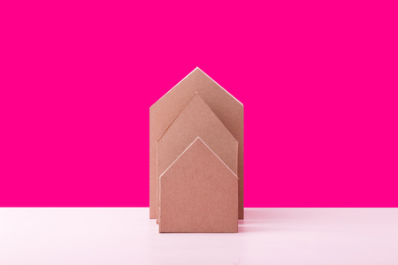 three house model cardboard with free copyspace house loan business conceptの写真素材