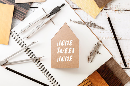 wood laminate veneer material sample for design management and interior construction on wooden floor with free copyspace for your textの写真素材