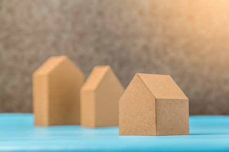 three house model cardboard with free copyspace house loan business conceptの写真素材