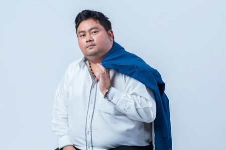 fat asian business man with shirt isolate on white backgroundの写真素材